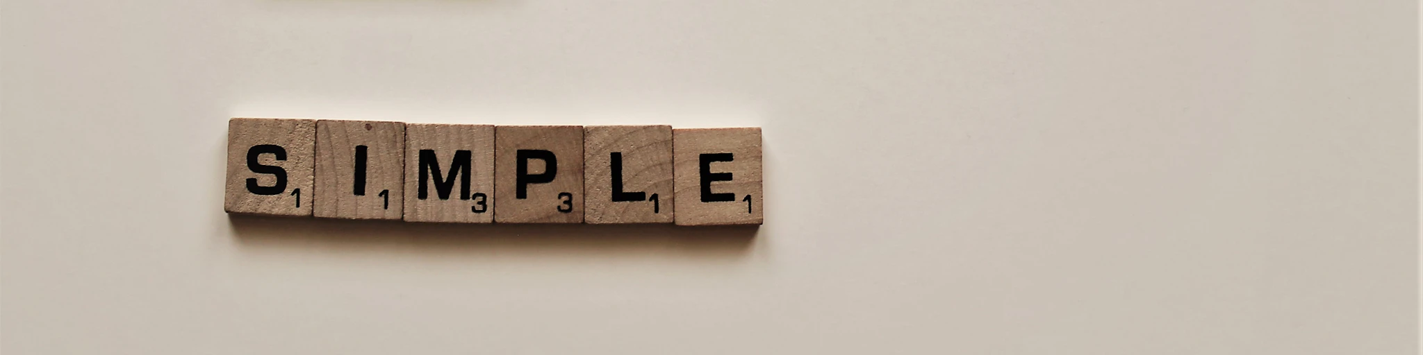 brown ITS SIMPLE scrabble tiles
