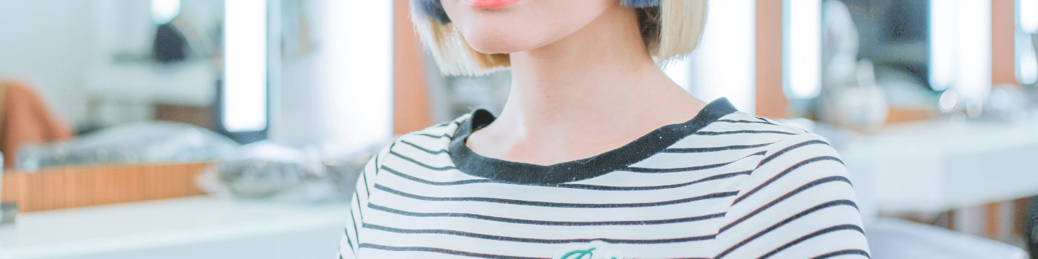 woman wearing black and white striped shirt
