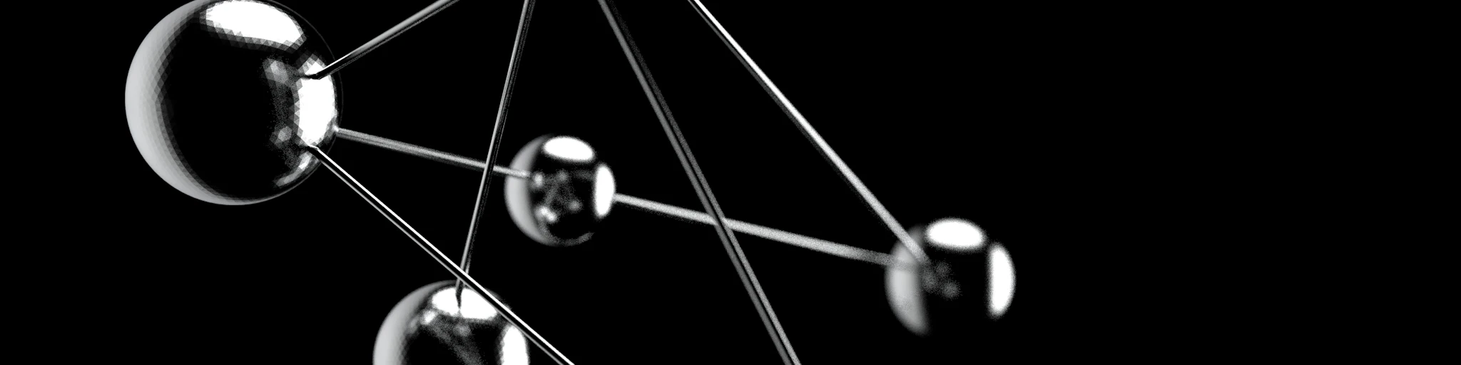 a black and white photo of a group of spheres