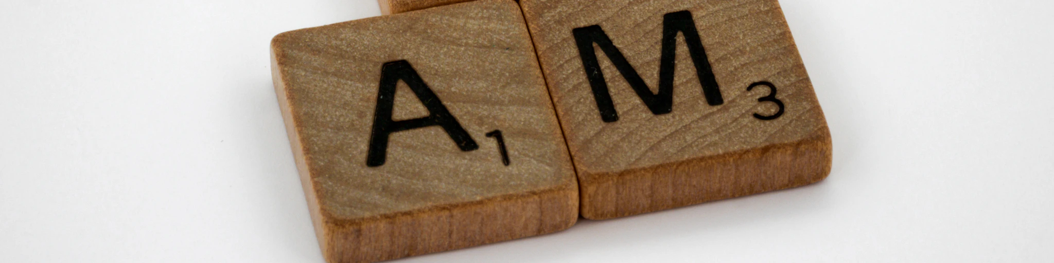 brown wooden letter t-letter