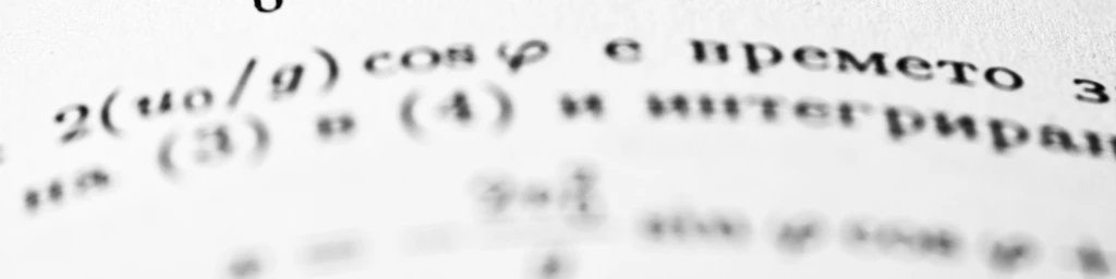 Mathematical equations are written on a page.