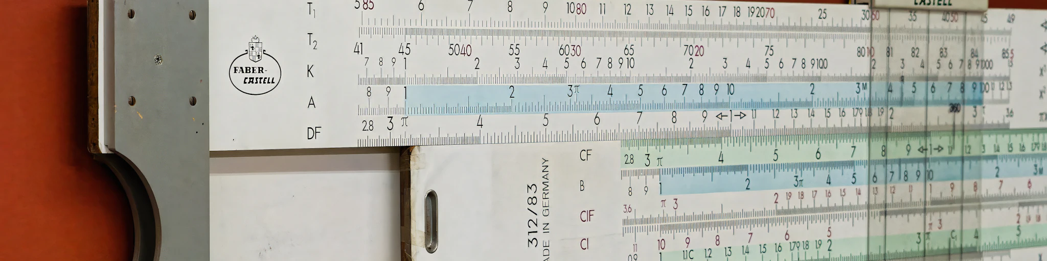 A large ruler mounted to the side of a wall