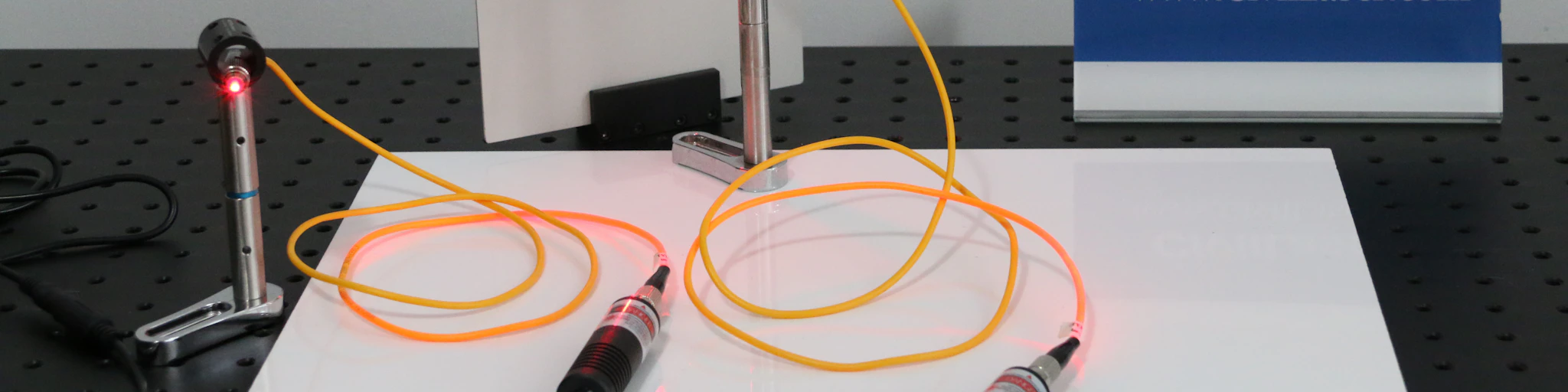 black and gray corded laser machine tool